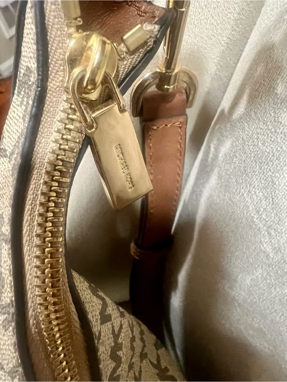 Michael Kors tassel gold